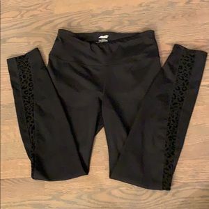 Black, skin-tight, cheetah-print leggings